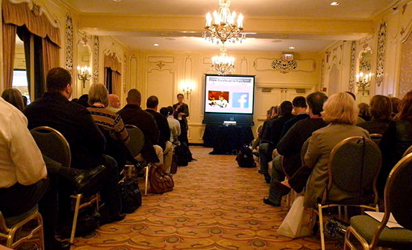 Bishop Sally Dyck address the UM Communicators conference in Chicago, IL