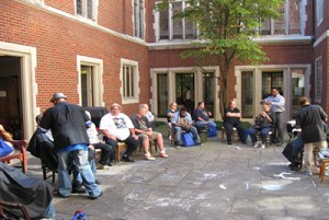 Congregating in outdoor common area.