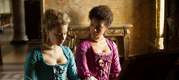 Two women in period clothes