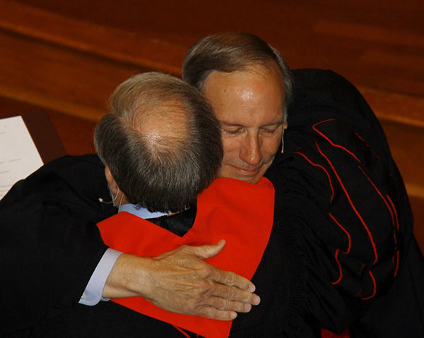 Rev. Cummings and Rev. Dr. Wilson exchange hugs