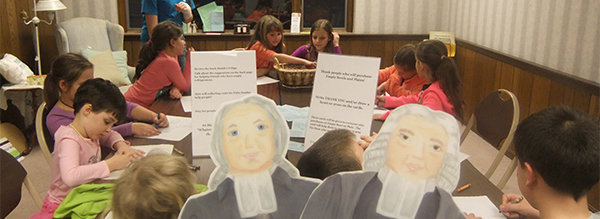 Flat Wesleys pictured with kids doing crafts