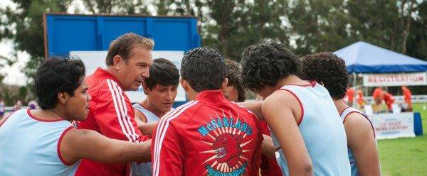 Coach and team together in circle