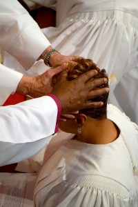 Laying on of the hands - close-up