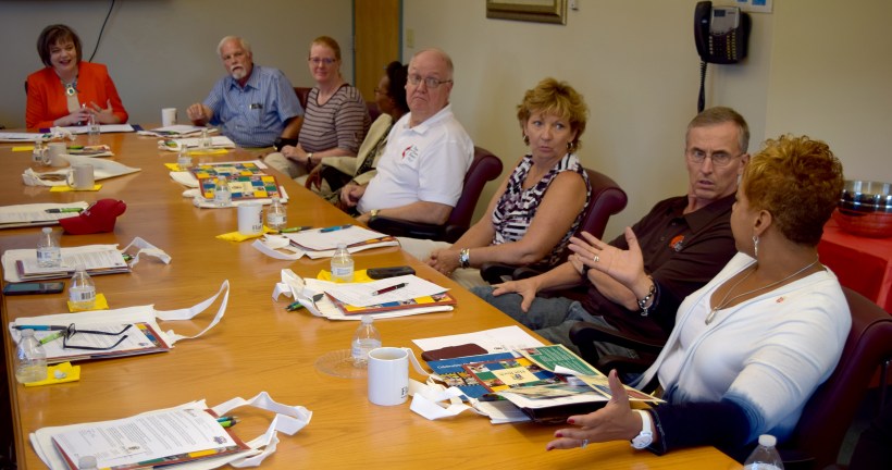 Bishop, cabinet nad Flat Rock direcotr meeting