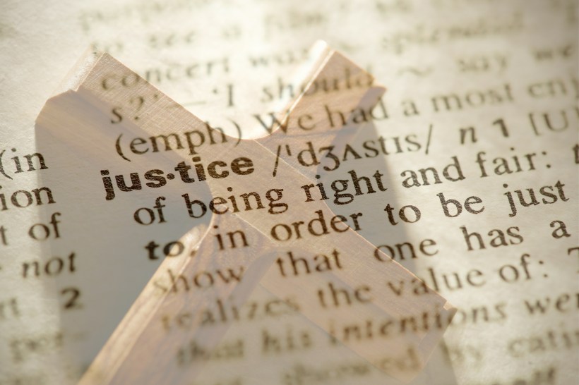 Dictionary definition of the word Justice and cross