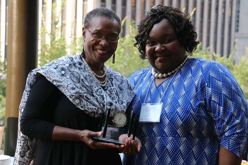 Bishop Linda Lee accepted a gift on behalf of Bishop Cynthia Moore-Koikoi from the Rev. Telley Lynette Gadson
