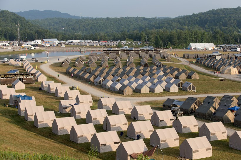 Rows of tents house Boy Scouts, staff and volunteers