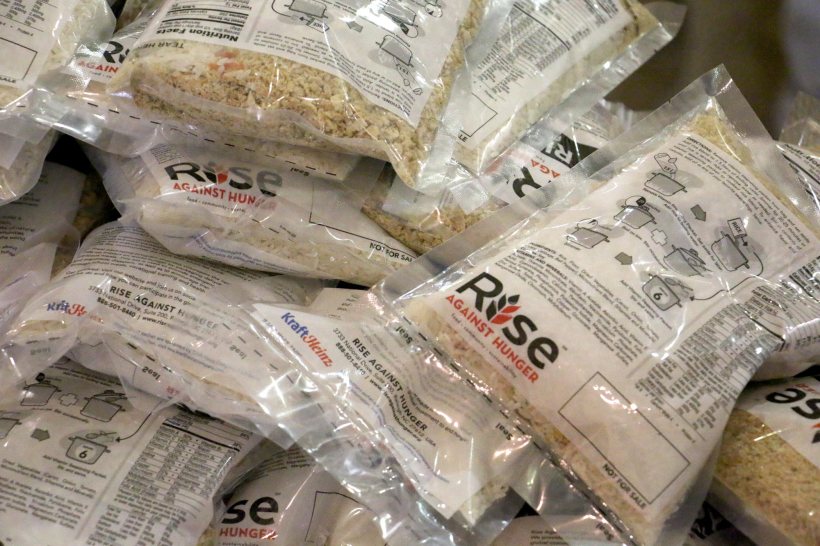 Bags of rice with Rise label on them